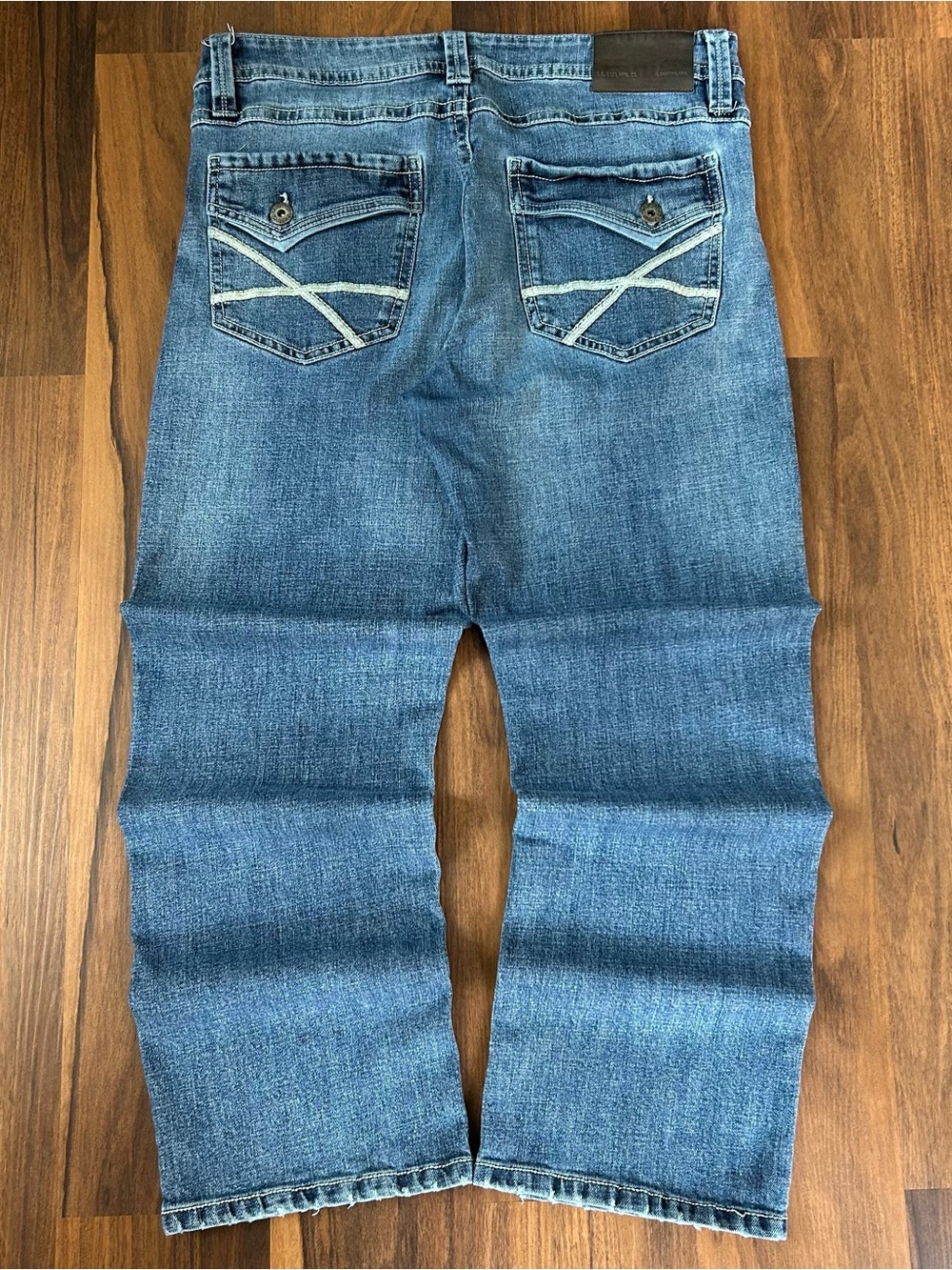 Y2K style TK Axel medium was blue bootcut denim jeans. 34”